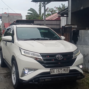 oyota Rush - Armada travel Medan ke Pekanbaru terpercaya